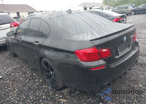 2015 BMW M5 z USA, uszkodzony, nr VIN WBSFV9C52FD595287